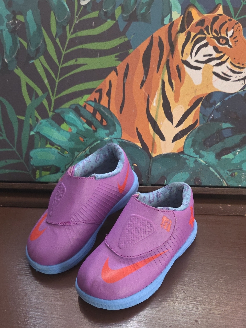 Nike KD Kids Purple Slip-On Sneakers with Orange Swoosh and Light Blue Sole